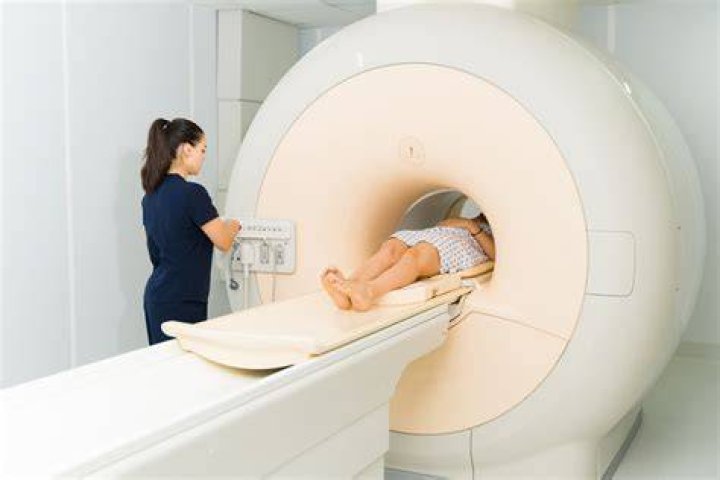 Can you wear ear plugs in MRI?